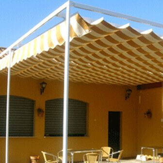 Todo Toldo toldo retractable amarillo